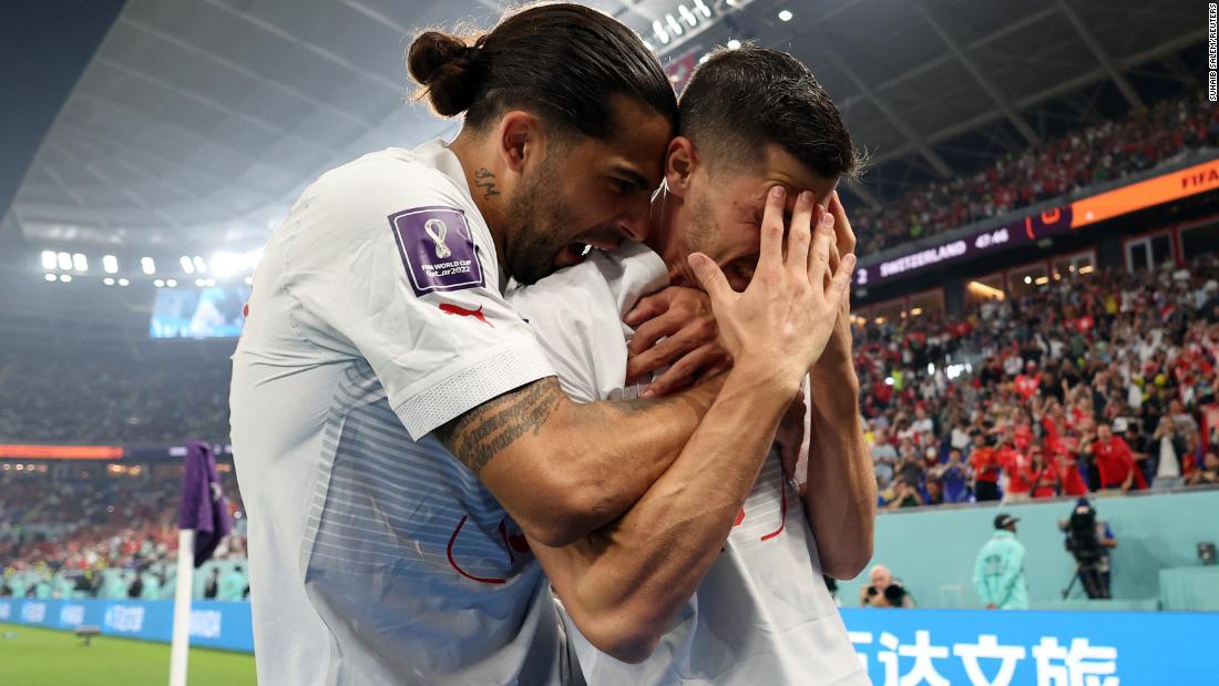 Switzerland&#39;s Remo Freuler, right, celebrates with Ricardo Rodriguez after scoring the third and decisive goal in the 3-2 victory over Serbia on December 2. With the win, Switzerland advanced to the next stage of the World Cup.