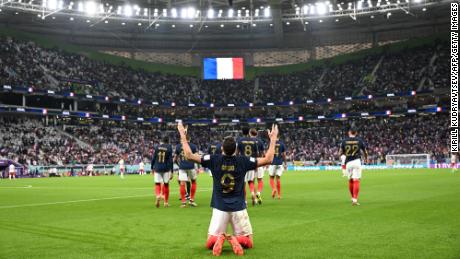 Giroud celebrates becoming France&#39;s all-time top scorer.