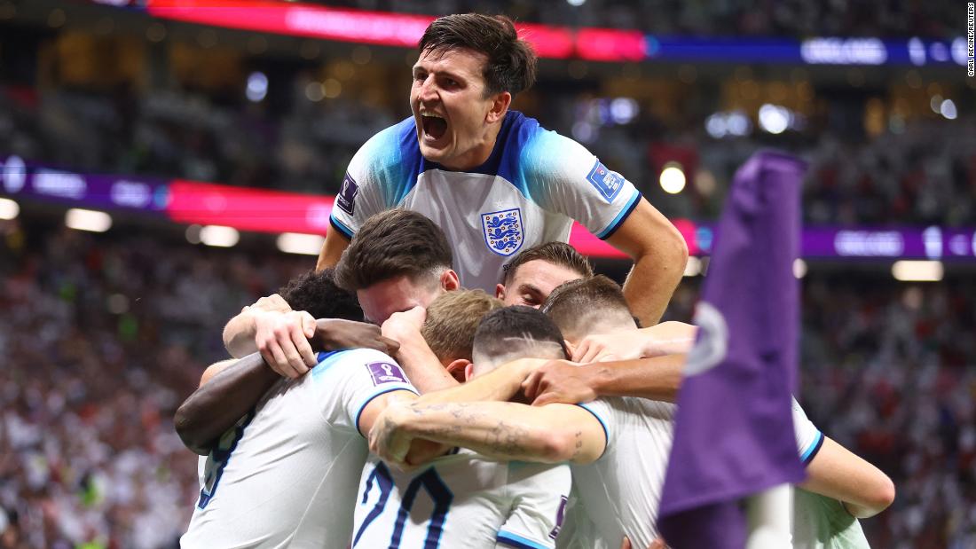 England players celebrate after Harry Kane scored against Senegal on December 4. England won 3-0 to advance to the quarterfinals.