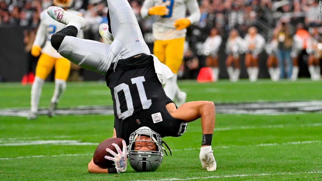 Las Vegas Raiders wide receiver Mack Hollins goes upside down on a reception during the first half against the Los Angeles Chargers. The Raiders eventually beat the Chargers 27-20, largely thanks to a monster afternoon for star wide receiver Davante Adams, who finished with 177 receiving yards and two touchdowns. 