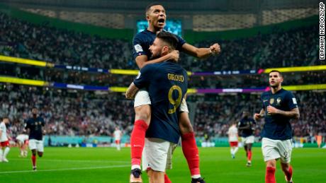 France&#39;s Olivier Giroud celebrates with Kylian Mbappé after scoring the opening goal against Poland at the 2022 World Cup. 