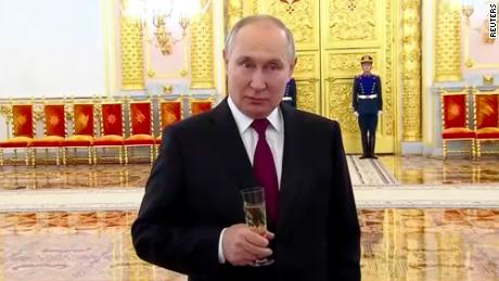 &#39;Who started it?&#39; Putin sips champagne as he defends assault on Ukrainian civilian infrastructure