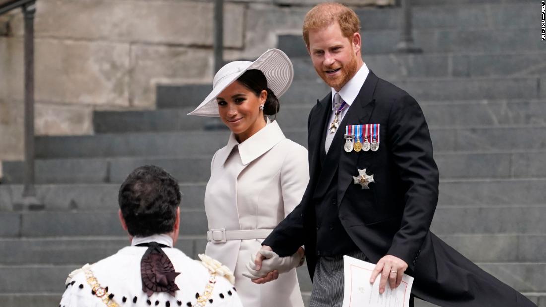 Harry and Meghan depart St Paul&#39;s Cathedral in London after attending a service honoring Queen Elizabeth II in June 2022. They flew in from the United States to attend the Queen&#39;s jubilee celebrations, and they were warmly welcomed by a crowd outside the service.