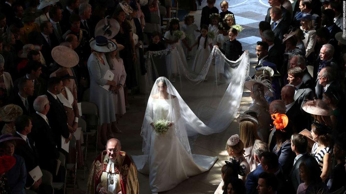 Markle walks down the aisle of St. George&#39;s Chapel during &lt;a href=&quot;https://www.cnn.com/interactive/2018/05/world/royal-wedding-cnnphotos/&quot; target=&quot;_blank&quot;&gt;her wedding to Prince Harry&lt;/a&gt; in May 2018. She was unescorted in what was &lt;a href=&quot;https://www.cnn.com/interactive/2018/05/world/royal-wedding-cnnphotos/#:~:text=an%20unprecedented%20step&quot; target=&quot;_blank&quot;&gt;an unprecedented step&lt;/a&gt; for a royal bride in the United Kingdom. Her father was unable to attend the wedding &lt;a href=&quot;https://www.cnn.com/interactive/2018/05/world/royal-wedding-cnnphotos/#:~:text=because%20of%20health%20concerns.&quot; target=&quot;_blank&quot;&gt;because of health concerns&lt;/a&gt;.