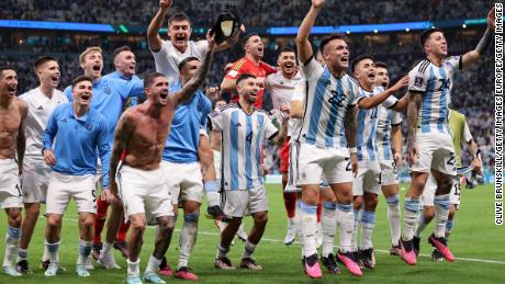 Argentina players celebrate after winning the penalty shootout against the Netherlands.