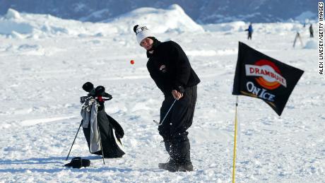 Jack O&#39;Keefe of USA in action during the 2002 Drambuie World Ice Golf Championships in Uummannaq, Greenland.