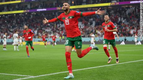 Youssef En-Nesyri of Morocco celebrates after scoring the team&#39;s first goal during the FIFA World Cup Qatar 2022 quarter final match between Morocco and Portugal at Al Thumama Stadium on December 10, 2022 in Doha, Qatar. 