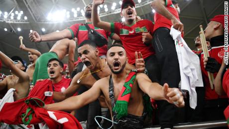 Morocco fans celebrate after their team&#39;s victory over Portugal on December 10, 2022 in Doha, Qatar. 
