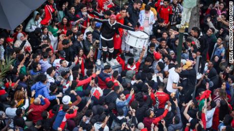 Morocco supporters in the country&#39;s capital of Rabat react after their country&#39;s win over Portugal. 