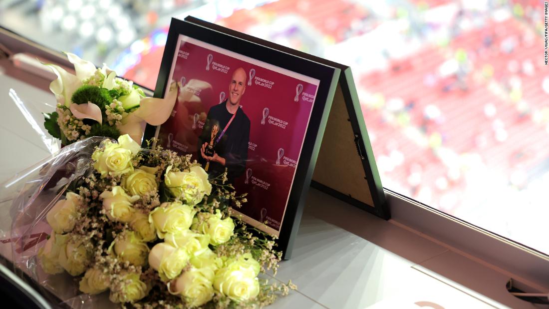 A memorial for American journalist Grant Wahl sits in the press area of Al Bayt Stadium on December 10. &lt;a href=&quot;https://www.cnn.com/2022/12/14/us/grant-wahl-cause-death/index.html&quot; target=&quot;_blank&quot;&gt;Wahl died after collapsing&lt;/a&gt; during the quarterfinal match between Argentina and the Netherlands. His wife, Dr. Celine Gounder, said he died of an aortic aneurysm that ruptured.