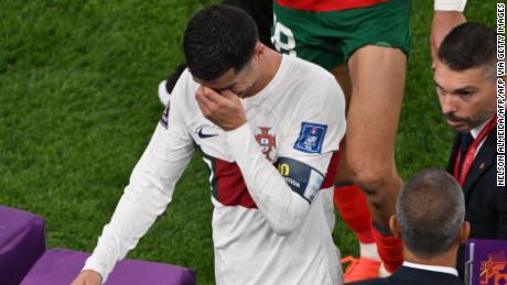 Cristiano Ronaldo leaves the pitch in tears after Portugal lost 1-0 to Morocco.
