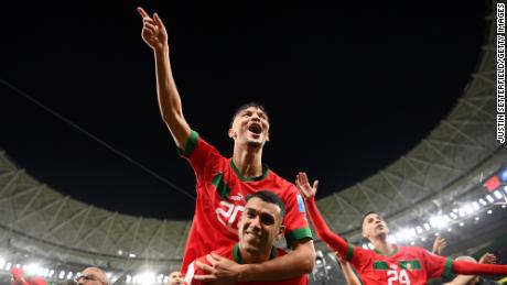 Achraf Dari and Walid Cheddira of Morocco celebrate the team&#39;s 1-0 World Cup quarterfinal victory against Portugal