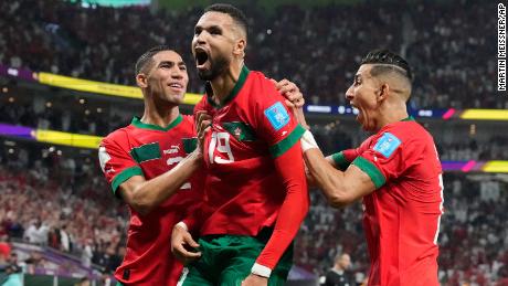 Morocco&#39;s Youssef En-Nesyri, center, celebrates after scoring the only goal in his side&#39;s World Cup quarterfinal win over Portugal, at Al Thumama Stadium in Doha, Qatar, on December 10, 2022.
