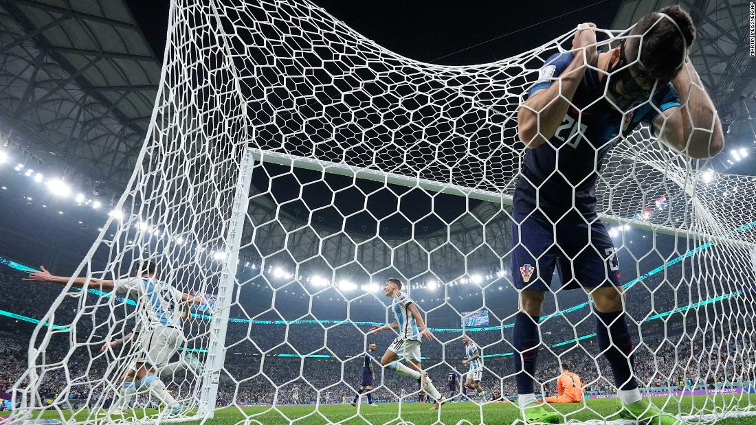 Croatian defender Joško Gvardiol reacts in the net after Álvarez scored to put Argentina up 3-0.