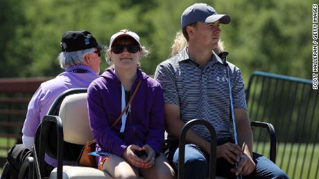 Spieth and his sister ride the buggie at the Houston Open in 2016.