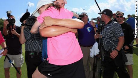 Spieth hugs Ellie after winning the DEAN &amp; DELUCA Invitational at Colonial Country Club, Texas, in 2016.