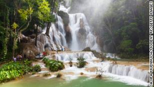 Three-tiered Kuang Si Falls is just south of UNESCO-listed Luang Prabang.