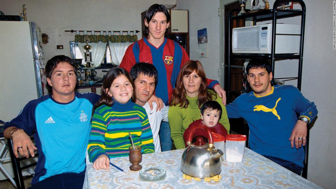 Messi, top, poses with members of his family in Rosario in 2003. Below him, from left, are brother Rodrigo, sister Maria Sol, father Jorge, mother Celia, nephew Tomás and brother Matías. As a young boy, Messi was diagnosed with a growth hormone deficiency. He played for the local club team, Newell&#39;s Old Boys, before signing with Spanish club FC Barcelona at age of 13. As part of the contract, Barcelona agreed to pay for Messi&#39;s hormone treatments.