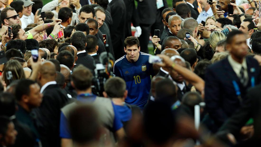 Messi walks with Argentina teammates after losing the World Cup final to Germany in July 2014. Messi won the Golden Ball award that is given to the tournament&#39;s top player.