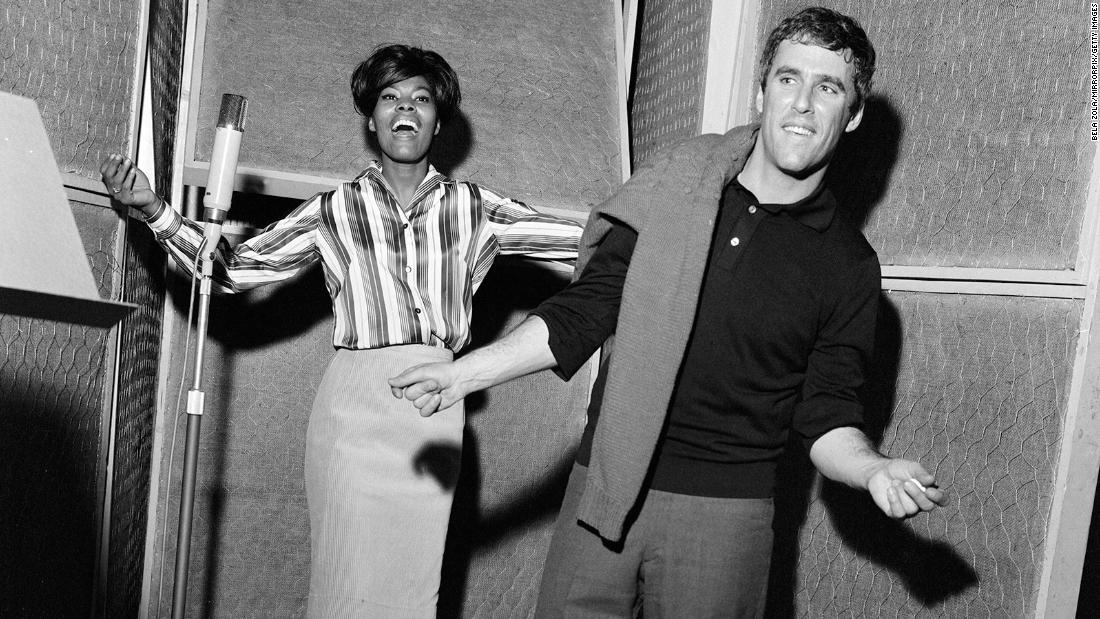 Warwick and songwriter Burt Bacharach record a song at Pye Studios in London in 1964. Warwick was discovered by Bacharach and fellow songwriter Hal David when she was 21. &quot;Don&#39;t Make Me Over,&quot; Warwick&#39;s first Bacharach-penned hit song, was released in 1962.