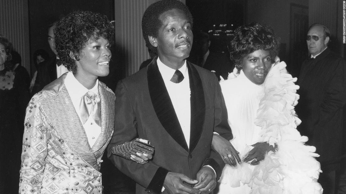 From left, Warwick; her husband, William; and her sister, Dee Dee, attend the Academy Awards in 1972. Warwick&#39;s sister was also a singer.