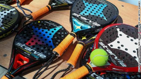 Padel rackets are a different shape and size to those used in tennis or squash. 
