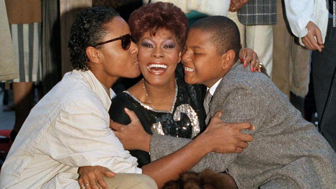 Warwick is embraced by her sons David, left, and Damon as she gets a star on the Hollywood Walk of Fame in December 1985.