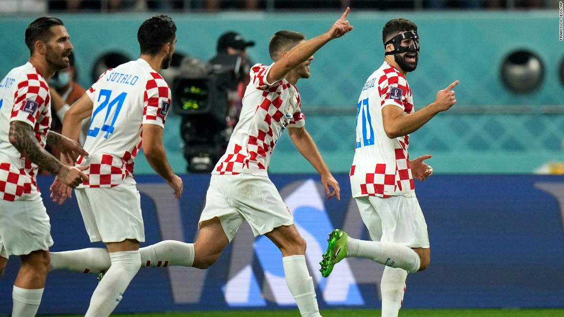 Croatia&#39;s Joško Gvardiol, right, celebrates after scoring his side&#39;s opening goal against Morocco. 