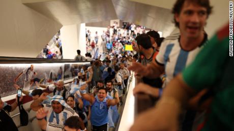 Fans are seen on the Doha Metro ahead of the match between Argentina and Mexico.