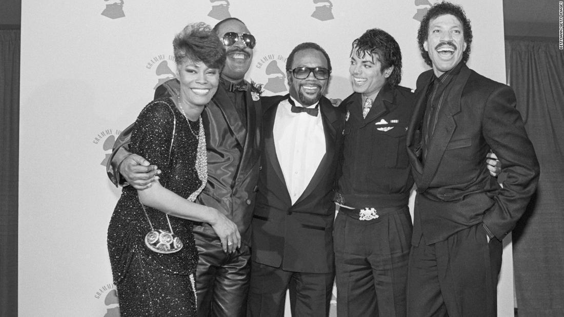 From left, Warwick, Wonder, Quincy Jones, Michael Jackson and Lionel Richie celebrate backstage at the Grammy Awards in February 1986. The group collaborated on the song &quot;We Are The World,&quot; which won three Grammys. The song&#39;s music video also won a Grammy. 