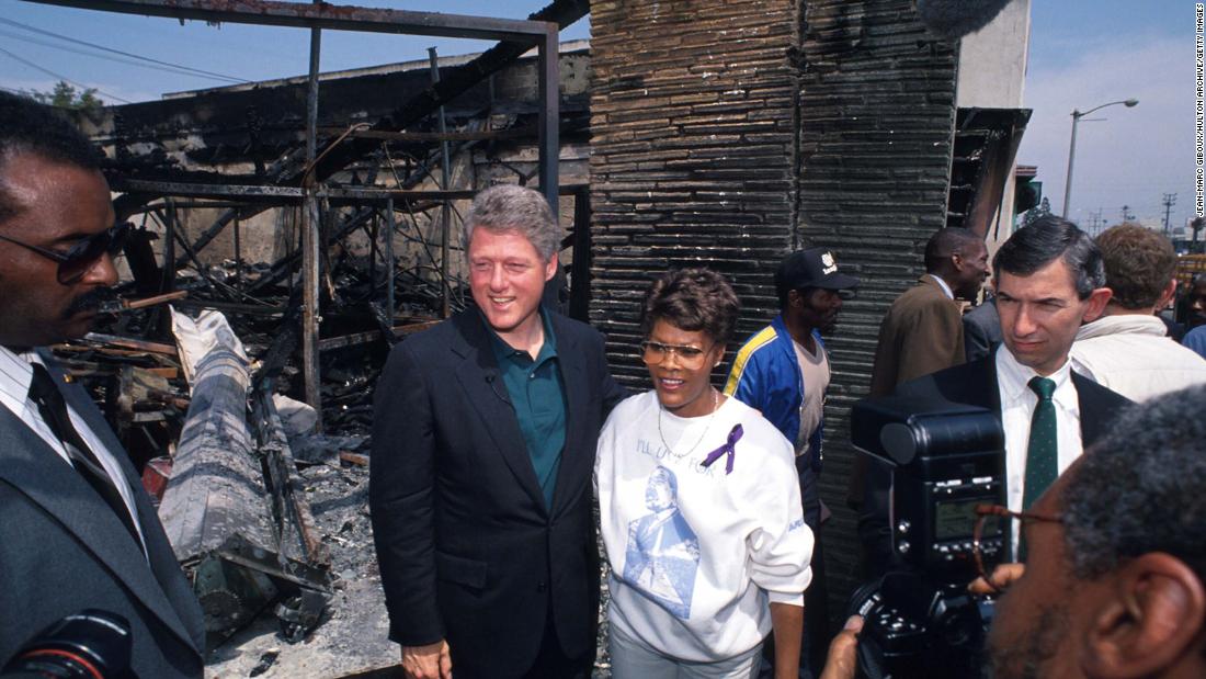 Presidential candidate Bill Clinton, then governor of Arkansas, stands with Warwick in Los Angeles in May 1992. This was after the riots that happened in the city after four police officers were acquitted of beating Black motorist Rodney King.