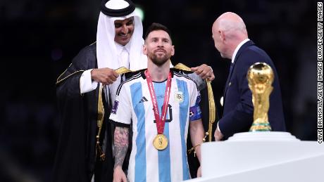 Sheikh Tamim placed a bisht on Messi during the trophy presentation. 