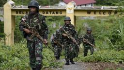 221219203045 01 indonesia soldiers papua 031716 file hp video Indonesia president supports plan to scale back troops in restive Papua