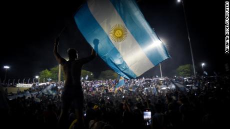Fans gather outside the Argentine Football Association&#39;s training ground ahead of the team&#39;s arrival.