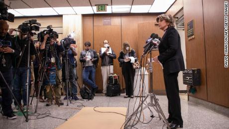 Attorney Gloria Allred converses with reporters after Harvey Weinstein is found guilty of three counts of sexual assault in Los Angeles, on December 19, 2022. 