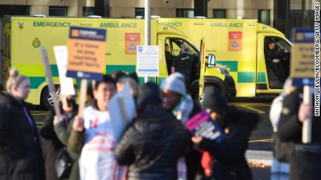 Britons urged to avoid risky activity as paramedics join strikes. How did things get so bad?