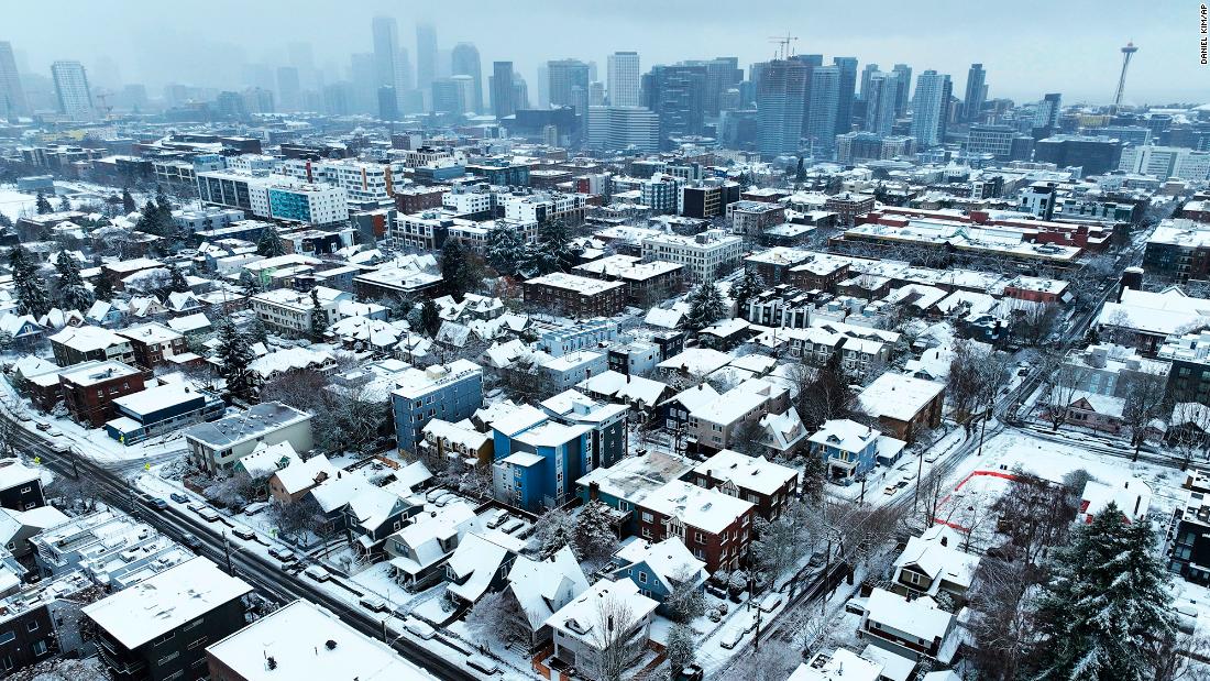 Snow covers homes in Seattle on December 20. 