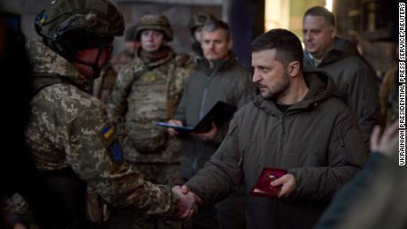 Ukraine&#39;s President Volodymyr Zelenskiy awards a Ukrainian service member at a position in the frontline town of Bakhmut, amid Russia&#39;s attack on Ukraine, in Donetsk region, Ukraine December 20, 2022. Ukrainian Presidential Press Service/Handout via REUTERS ATTENTION EDITORS - THIS IMAGE HAS BEEN SUPPLIED BY A THIRD PARTY.

