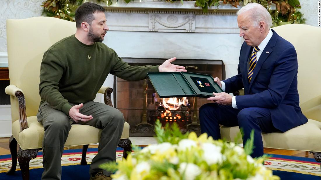Zelensky speaks after giving Biden a gift. He &lt;a href=&quot;https://www.cnn.com/europe/live-news/russia-ukraine-war-news-12-21-22/h_5daaaace8ac5173e9d501b3b86978113&quot; target=&quot;_blank&quot;&gt;presented Biden&lt;/a&gt; with a Cross of Combat Merit. Zelensky explained that a captain in the Ukrainian military fighting in the Donbas region asked that his award be given to Biden.