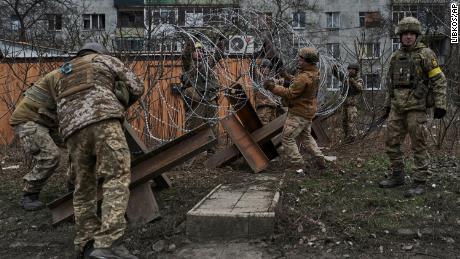 Ukrainian soldiers prepare barricades in Bakhmut, which has become the epicenter of attacks from the private military company Wagner.