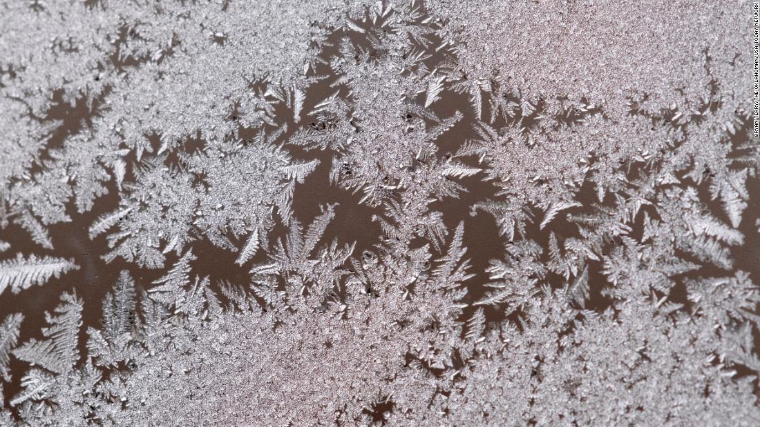 Ice collects on a window in Oklahoma City on December 22.