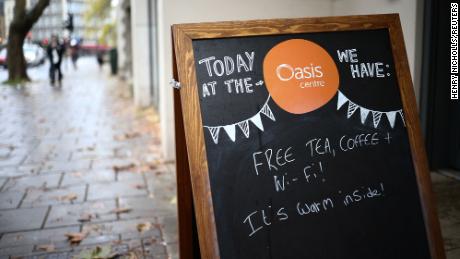 A welcoming sign outside the Oasis Centre, an open to all communal area which acts as a &#39;warm bank&#39;, in London, on December 12.