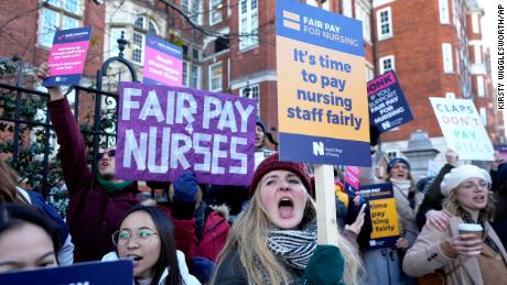 Nurses demonstrate outside the Royal Marsden Hospital in London, UK on December 15, 2022, during what is expected to be a month of strikes by public service workers. 