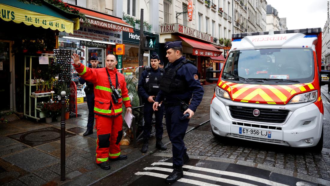 Police fire teargas to quell protesters at site of deadly Paris shooting