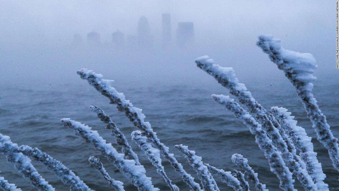 The Louisville skyline is obscured by steam rising from the Ohio River on December 23.