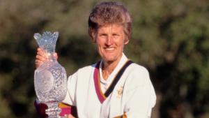 Kathy Whitworth, Team Captain for the United States holds the trophy aloft after Team USA defeated Europe in the inaugural Solheim Cup competition golf tournament on 18th November 1990 at the Lake Nona Golf &amp; Country Club in Orlando, Florida, United States. 