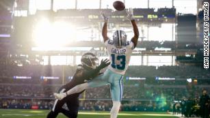 Tampa Bay Buccaneers wide receiver Mike Evans (13) stiff-arms Seattle  Seahawks safety Quandre Diggs (6) during an NFL football game on Nov. 13,  2022, in Munich. The Buccaneers defeated the Seahawks 21-16. (