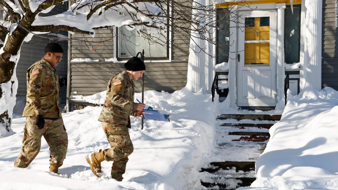 National Guard troops check on Buffalo residents on December 28.