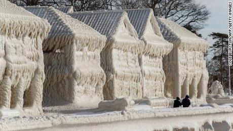 Homes on Lake Erie were encased in ice as blizzard whipped frigid waves onshore