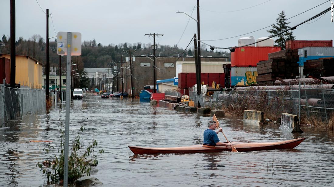 More than 16 million under flood watches as waves of heavy snow and rain inundate Western and Central US